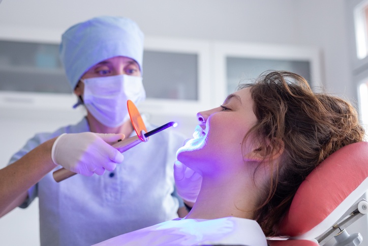 Trending dental procedure using an LED curing light in a clinic setting in South Bend, IN